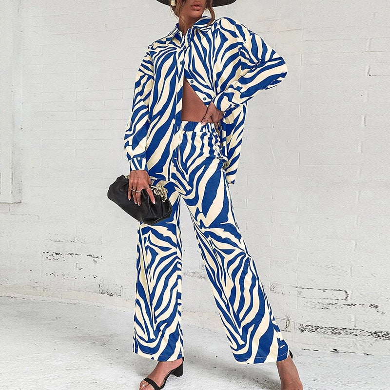 Emilie - Completo elegante con blusa a maniche lunghe e pantaloni a stampa astratta