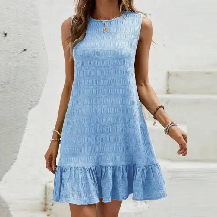 Milena - Elegante minidress senza maniche con volant sull’orlo