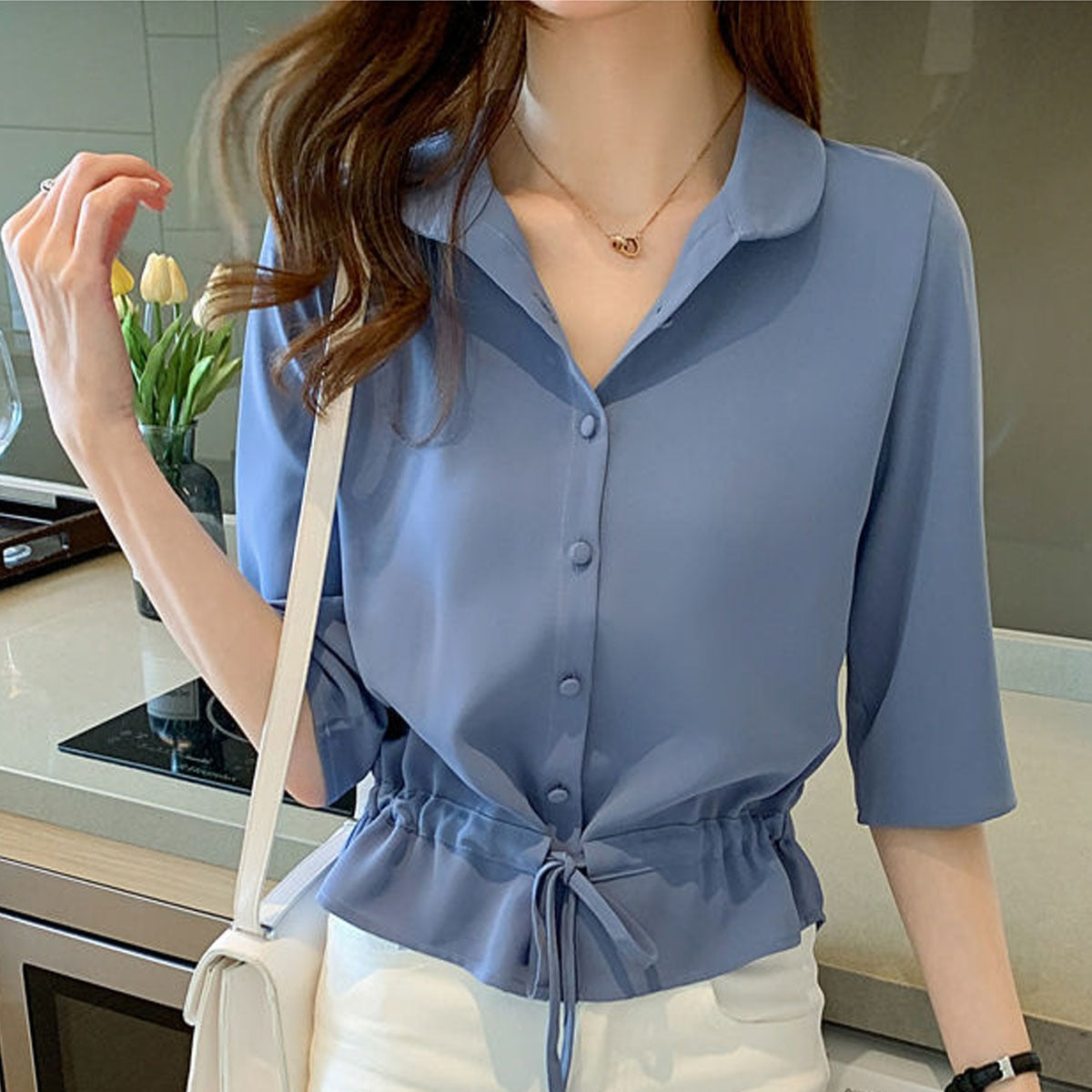 Zyrah - Elegante camicetta polo con bottoni
