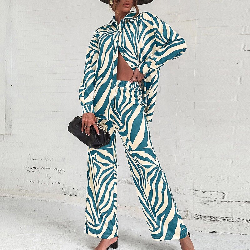 Emilie - Completo elegante con blusa a maniche lunghe e pantaloni a stampa astratta