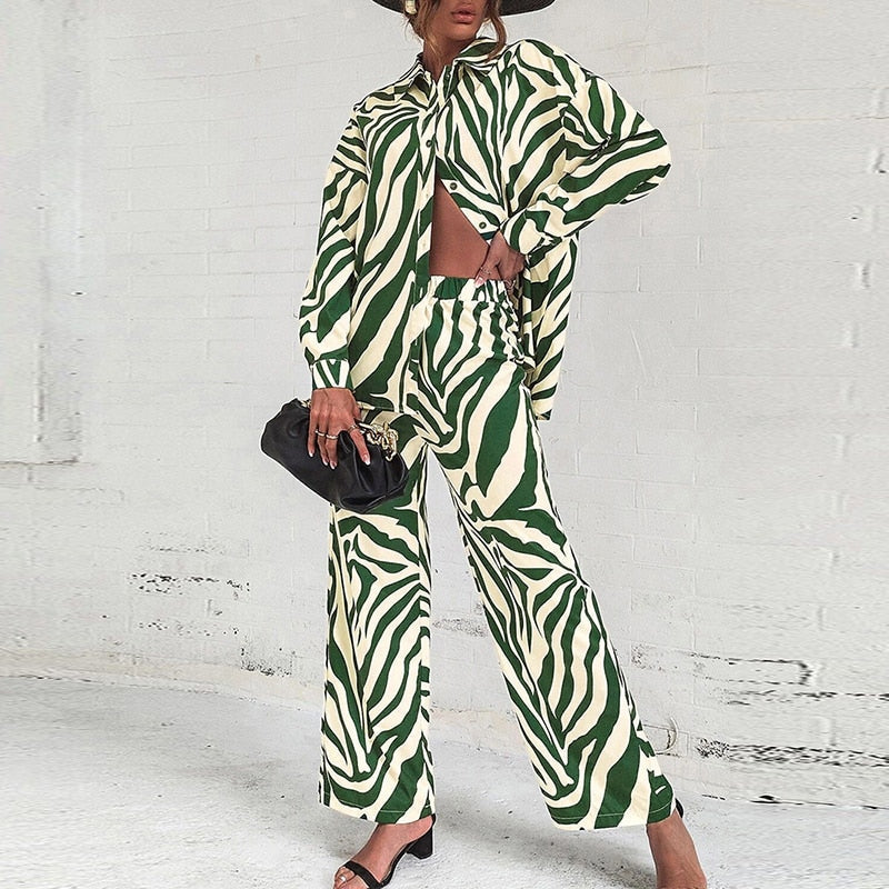 Emilie - Completo elegante con blusa a maniche lunghe e pantaloni a stampa astratta