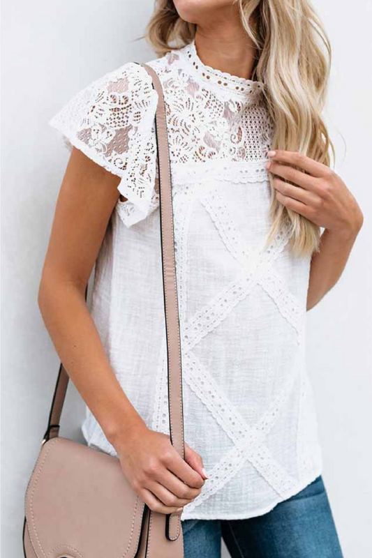 Laila - Blusa chic in pizzo geometrico a maniche corte