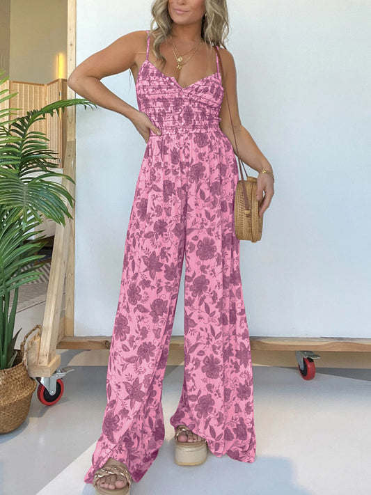 Jana - Elegante tuta floreale con spalline sottili e gamba larga