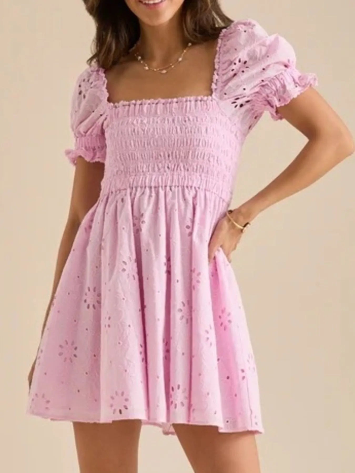 Emily - Minidress con maniche a sbuffo e schiena scoperta