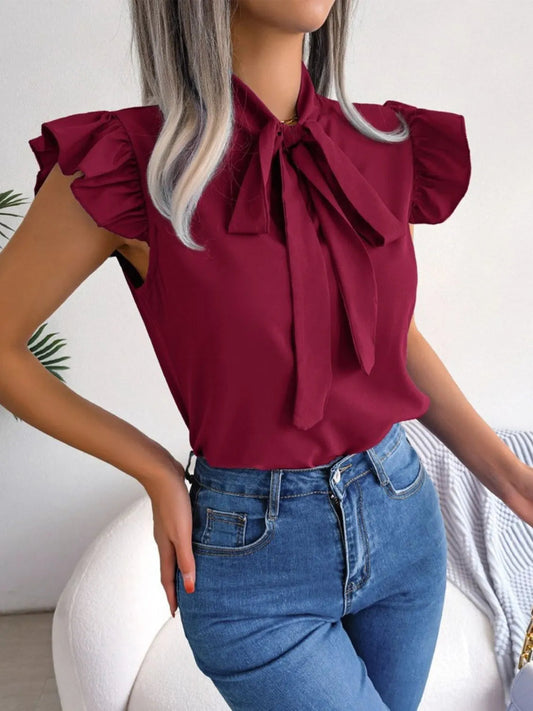 Marielle - Blusa con volant e fiocco al collo