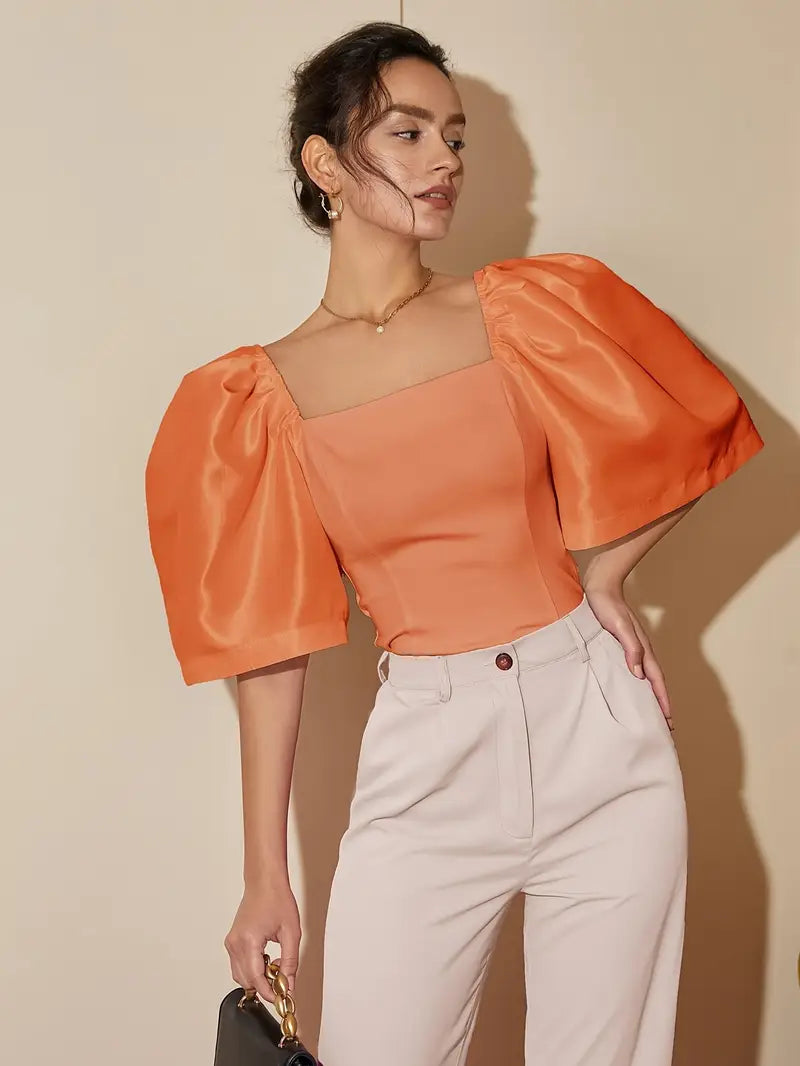 Connie - Elegante top con maniche a sbuffo e scollo quadrato