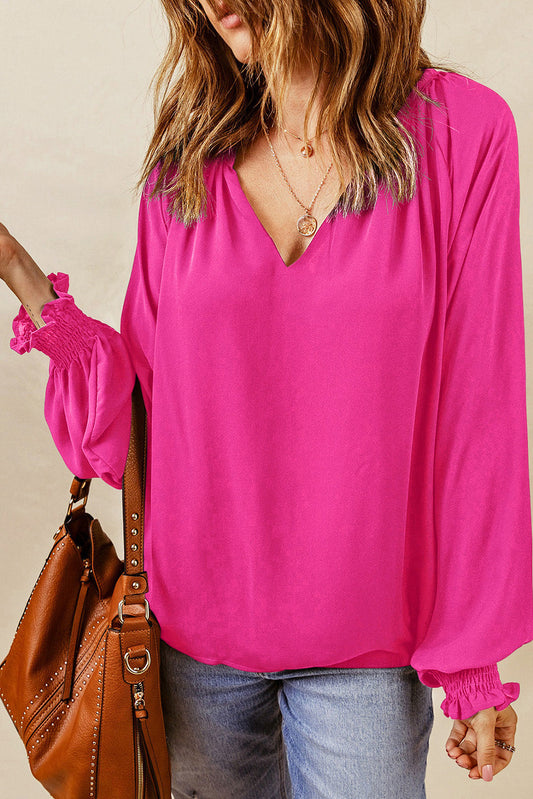 Eliana - Elegante blusa ampia a maniche lunghe con scollo a V con risvolto