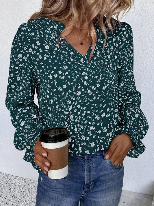 Valeria - Elegante blusa floreale a maniche lunghe con volant e scollo a V