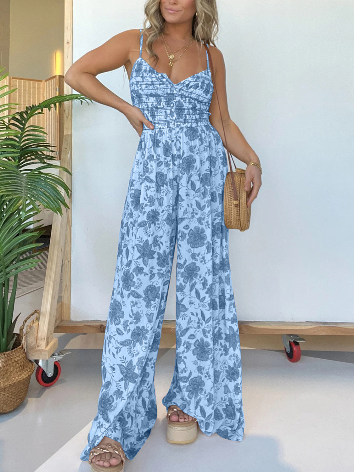 Jana - Elegante tuta floreale con spalline sottili e gamba larga