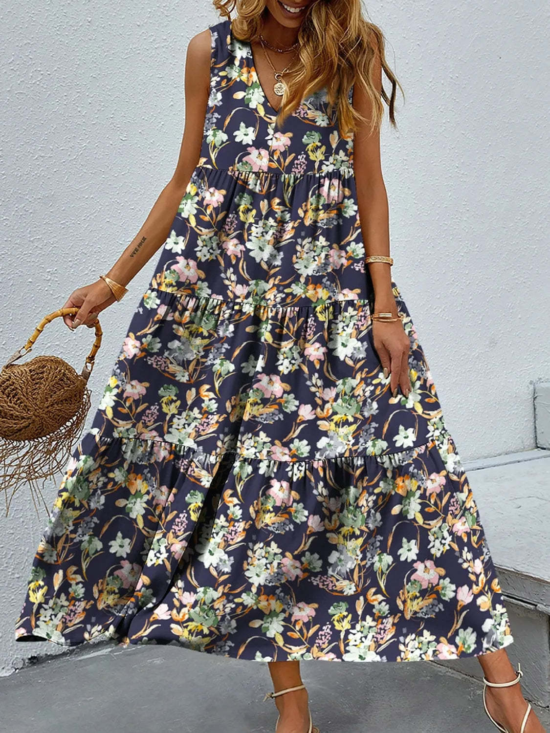 Taylor - Elegante abito maxi floreale senza maniche con scollo a V