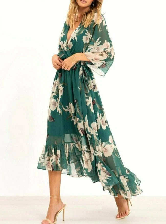 Maxi abito verde con maniche a 3/4 e scollo a V