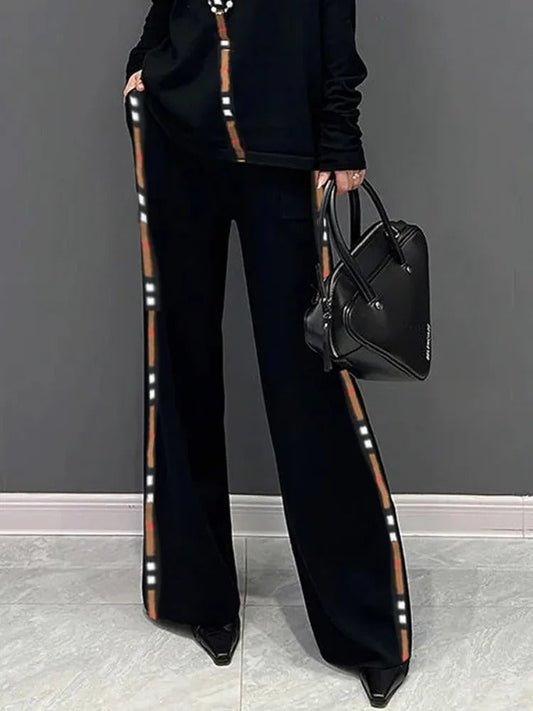 Eleanor - Pantaloni a righe elastiche a vita alta e gamba larga
